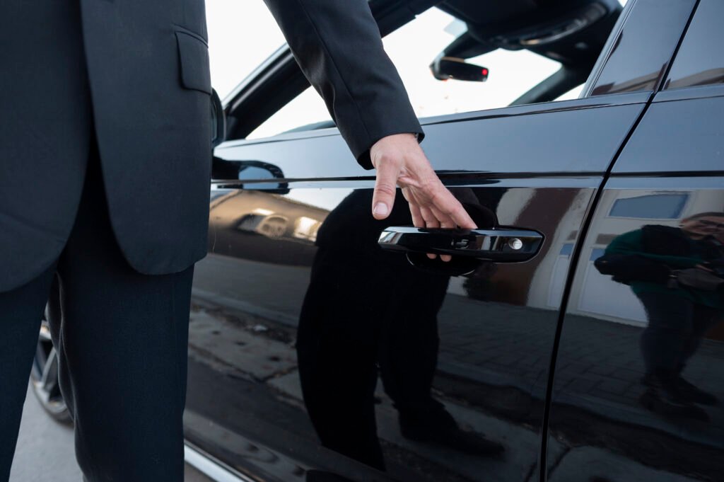 driver-dressed-elegant-costume corporate chauffeur service zurich airport